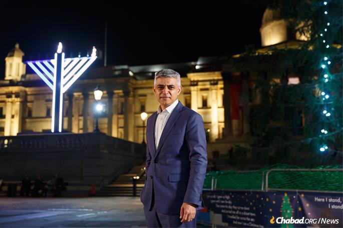 London Mayor Sadiq Khan at Chabad&#39;s menorah in Trafalgar Square on the first night of Hanukkah, Dec. 10, 2020.