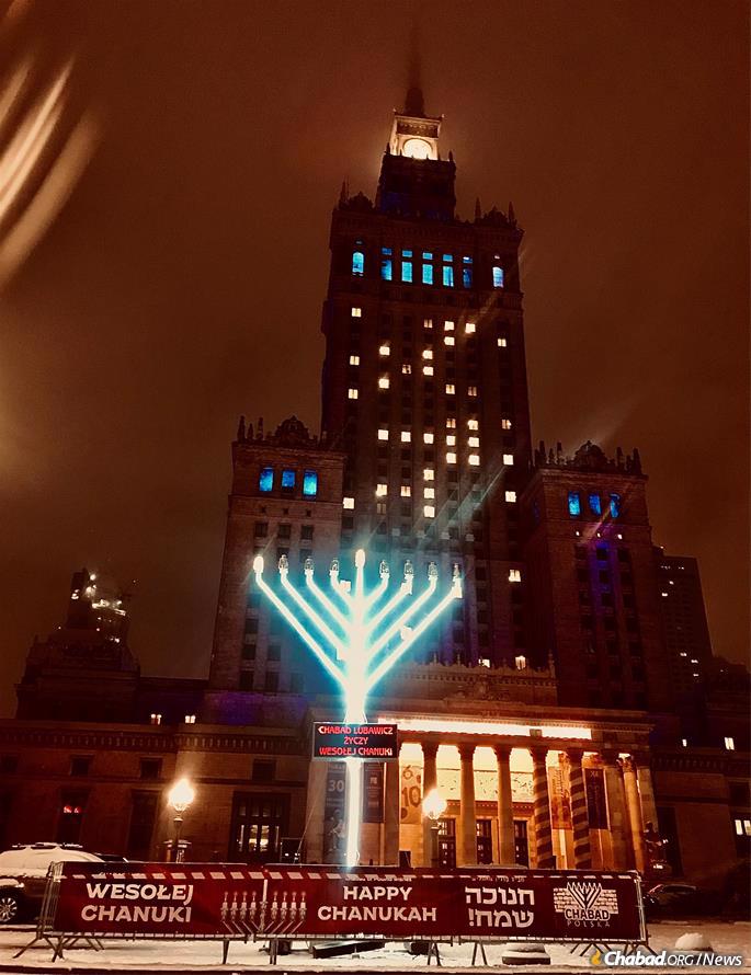 Chabad of Poland's public menorah in central Warsaw on the first night of Hanukkah, Dec.10, 2020.
