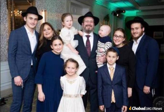 Rabbi Mendy and Chaya Chitrik and family.
