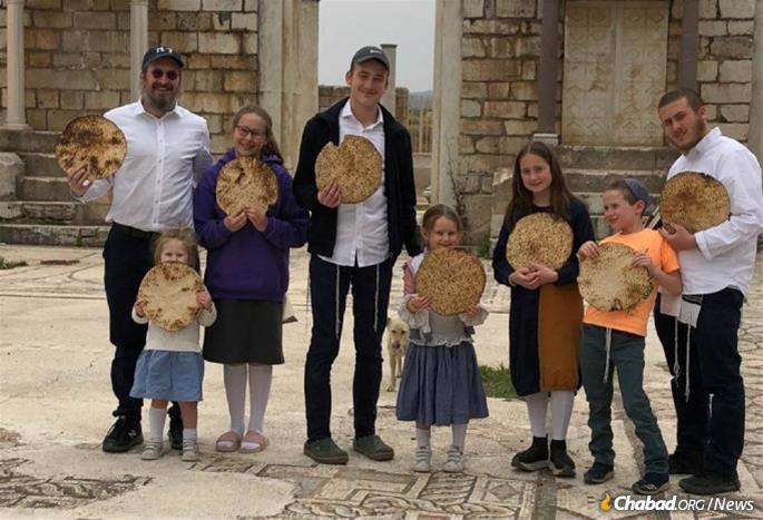 The Chitrik family delivers hand-made shmurah matzah before Passover.