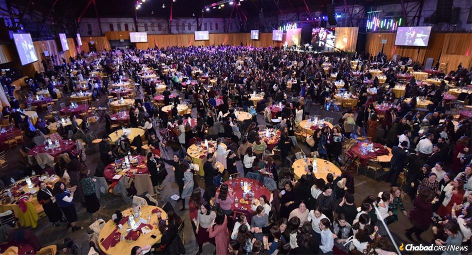 In 2019, thousands of women shown above gathered in New York for the International Conference of Chabad-Lubavitch Women Emissaries (Kinus Hashluchos). Even more will participate in the 2021 event, but due to the coronavirus pandemic, events will take place online. (Photo: Shmuel Amit)