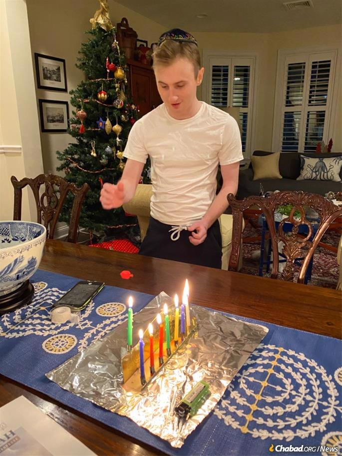 Thanks to a chance visit by Rabbi Levi Lezell, co-director of Chabad of the South Shore, Jimmy Hanley, 21, lit a Hanukkah menorah for the first time in his life.