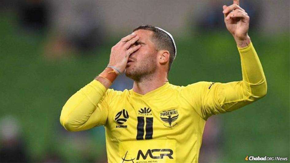 After scoring an important goal during a soccer match in Australia, Tomer Hemed reached into his jersey, took out a small white kippah (yarmulke), covered his eyes with his right hand and said the Shema, Judaism’s central prayer. (Photo: Tomer Hemed/Instagram)
