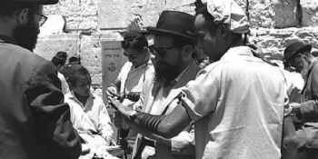 Pictures and newspaper clippings from the beginning of Mivtza Tefillin