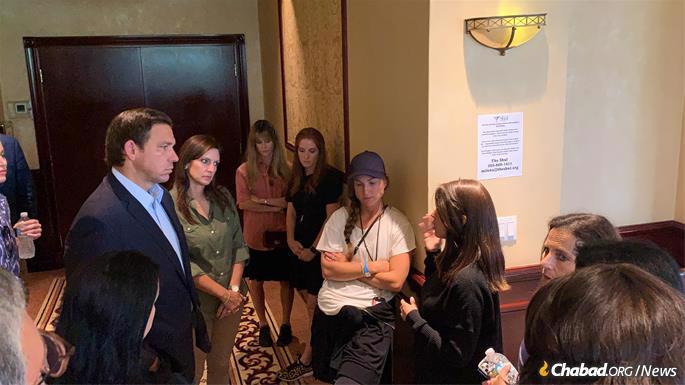 Florida Gov. Ron DeSantis hears from Chana Lipskar about some of the logistical issues they’ve encountered that they hoped to resolve.
