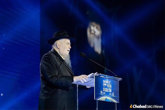 Rabbi Moshe Kotlarsky spoke about Chabad's ongoing expansion despite many ongoing challenges facing the world. (Photo: Chaim Tuito/Kinus.com)