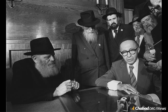 The Rebbe was 75-years-old at the time of his heart attack, seen here meeting with Israeli Prime Minister Menachem Begin in the Rebbe's office at 770 Eastern Parkway just months prior to the episode. (Photo: Yaacov Saar/GPO)