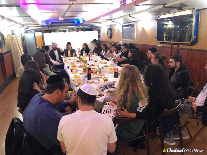 The boat is also a place for study sessions and joyous Chassidic gatherings.