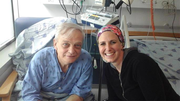 After the transplant, Roman Grenshspon poses with his kidney donor, Nahva Follman.