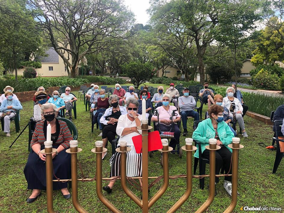 Getting ready for the menorah-lighting at a senior residence in Johannesburg, South Africa