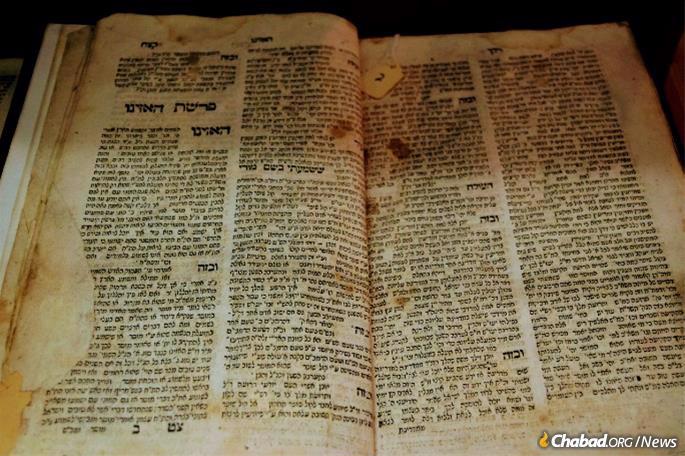 The earliest Chassidic book printed, the Toldos Yaakov Yosef (Koretz, 1780) on display at the exhibition room. (Photo: Mendel Super)