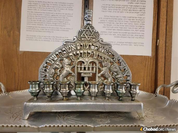The Rebbe's menorah on display in the library's exhibition room. (Photo: Mottel Sudak)