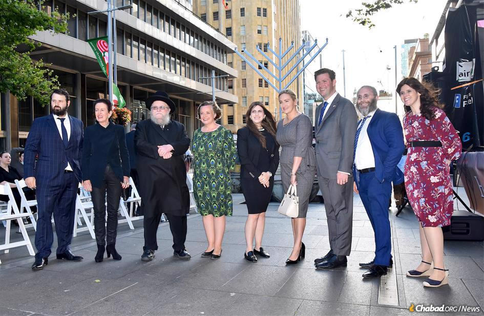 Lord Mayor of Sydney, Clover Moore, second from left, is joined at a Chanukah celebration in downtown Sydney, Australia, by (l. to r.) Rabbi Elimelech Levy, Rabbi Pinchus Feldman, Councillor Linda Scott, Chana Levy, Dr. Marjorie O'Neill MP, Scott Farlow MLC, Rabbi Danny Yaffe, and Sara Tova Yaffe.
