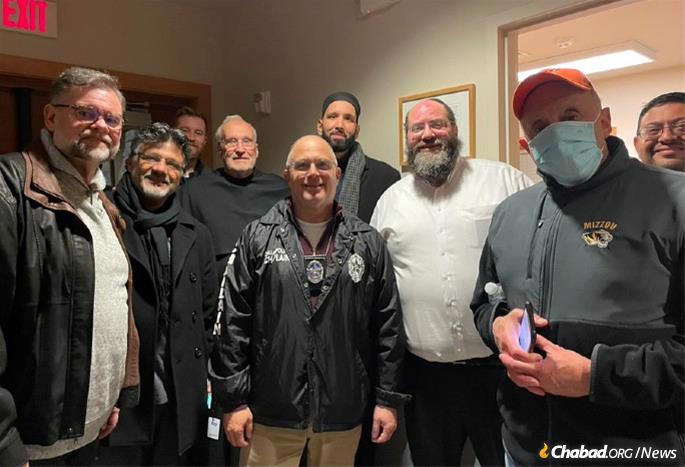 Rabbi Dov Mandel, co-director of Chabad-Lubavitch of Fort Worth, third from right, with clergy from the Dallas-Fort Worth metropolitan area, after the hostages had been freed. The group had gathered to offer prayers and support for the hostages and community.