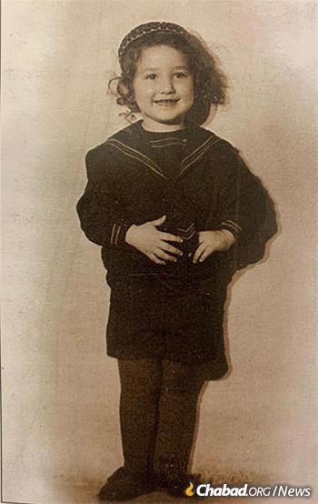 Kogan, with long hair and kippah, prior to his 1949 upsherenish, the traditional first-haircutting given to a boy when he turns three.