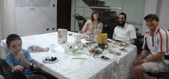 With Rabbi and Rebbetzin Raichman, and their young son, at the Chabad house.