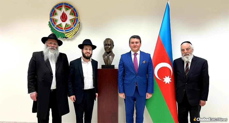 Rabbi Kalman Weinfeld, a member of the executive rabbinical council at OK Kosher, Rabbi Mendel Weinfeld; Consul General of Azerbaijan in Los Angeles Nasimi Aghayev; and David Taban, a philanthropist on the Chabad building committee. The four met this month to discuss Azerbaijan&#39;s support for the Chabad House. (Courtesy of Rabbi Mendel Weinfeld)