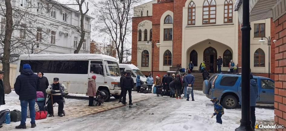 Chabad-Lubavitch of Kharkov is evacuating about 200 people a day on buses leaving the war-torn city for Dnipro, pictured here outside Kharkov&#39;s Choral Synagogue on March 7, 2022.