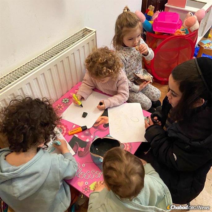 Refugee children play at Chabad of Romania. Rabbi Naftali Deutsch has already taken 20 children into his preschool.