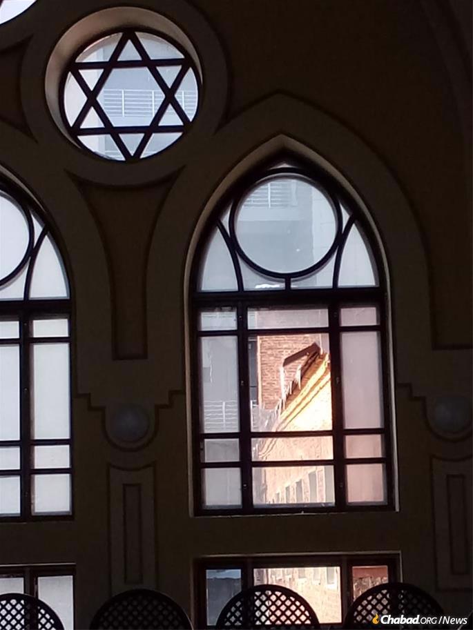 A massive Russian bomb destroyed the Nikolsky shopping center next door to Kharkov&#39;s Choral Synagogue on the evening of March 9, 2022. The force of the explosions blew open a number of synagogue windows.