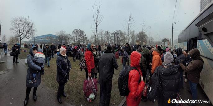 Refugees wait to board buses in Dnipro heading either directly to the border or to the train station, where they are taken west by rail. Photo: Dnipro Jewish Community.
