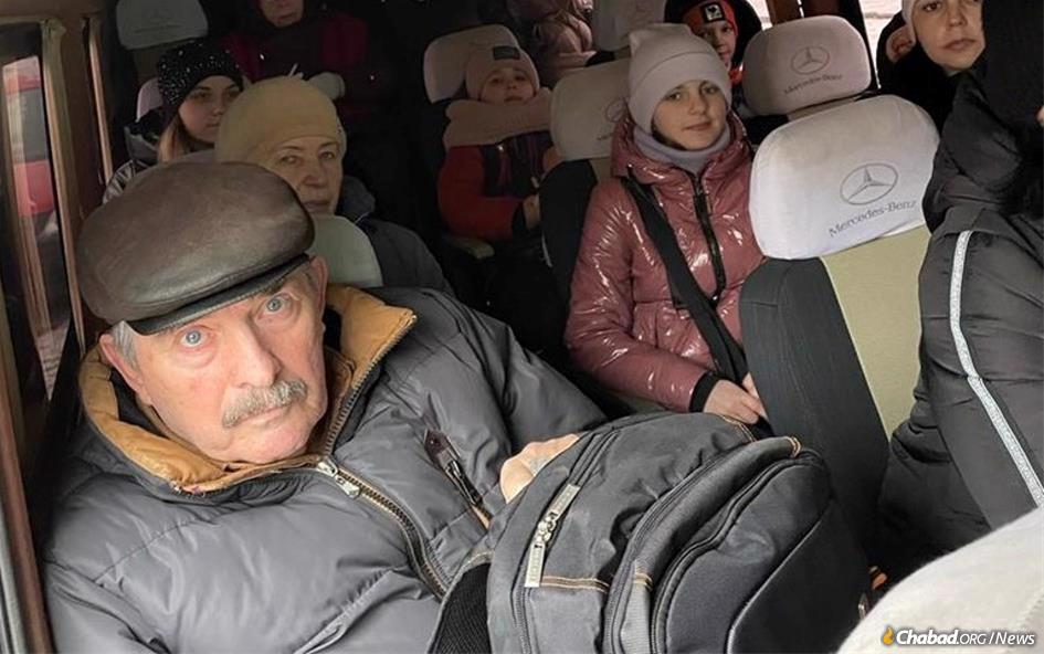 Refugees from Berdichev, Ukraine, flee the country on a bus provided by Chabad. Thousands like them have been encouraged and enabled to find shelter from the war's destruction.