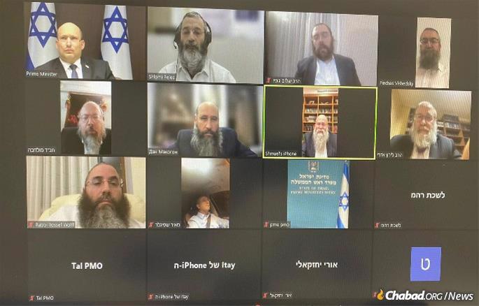 Prime Minister Naftali Bennett of Israel, upper left, met via Zoom with Chabad-Lubavitch rabbis leading the rescue of the Jews of Ukraine.