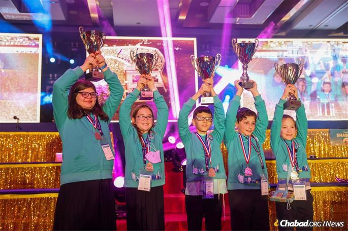 JewQ is open to students in third through seventh grades with one winner in each division. The winners at this year’s competition were: Chana Blois of Massachusetts; Avery McMullen of Pennsylvania; Yuval Dobzinski of Florida; Ezra Kovsky of Pennsylvania; and Noah Guzman of New York. (Photo: Itzik Roitman)
