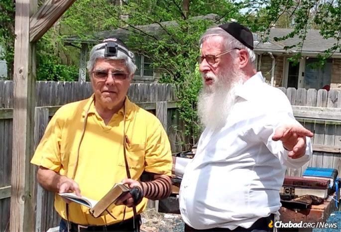 One pair of tefillin survived the fire and has already been used by community members stopping by to give their support in the cleanup effort.