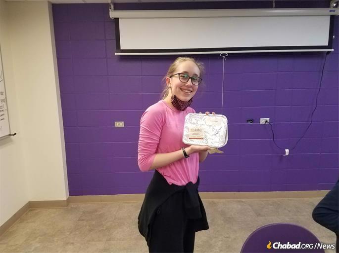 Student Anna Copeland displays her first kosher lunch purchased in school