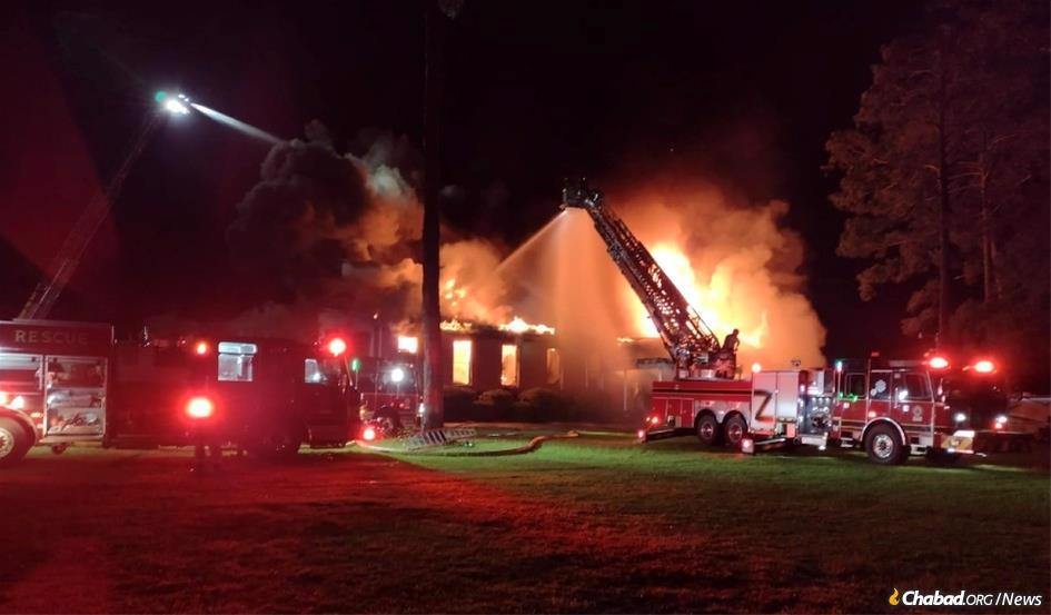Officials are investigating an early-morning fire that consumed the newly renovated building at Chabad of Tallahassee and destroyed the center's sacred Torah scrolls.