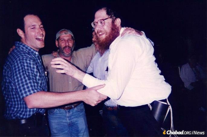 In celebration with congregants Ezra Cohen (left) and Alan Levy (center).