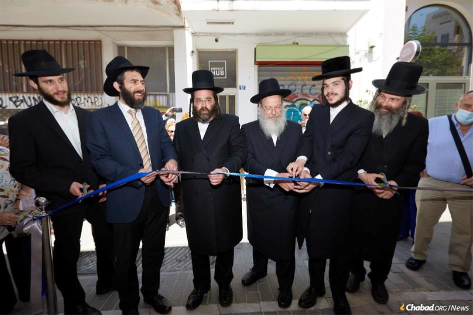 Rabbi Mendel Hendel, second from left, with donors who made the new mikvah in Athens, Greece, possible.