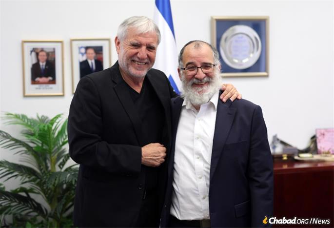 Israel's Social Affairs and Social Services Minister Meir Cohen with Rabbi Mendy Blau, Israel Director of Colel Chabad.
