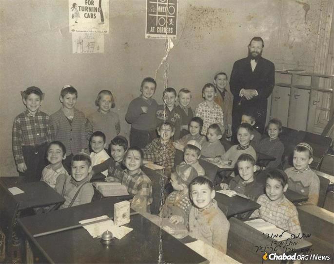 A natural and caring educator, Rabbi Weberman with his students at Beer Shmuel yeshivah in Boro Park in 1960.