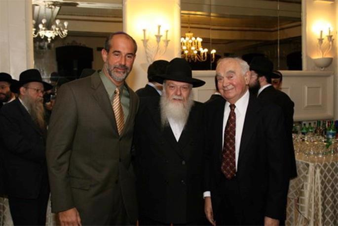 At a school function with supporters Sam (left) and Michael Rosenberg (right)