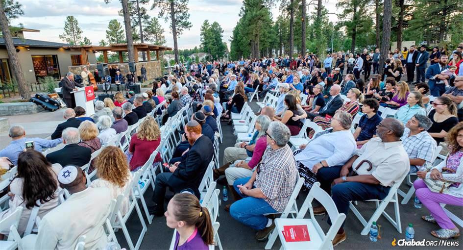 Hundreds turned out for the opening of a $7-million center in Flagstaff, Ariz. in 2019. In their invitation to join their High Holiday services this year they wrote: ‘At Chabad you don&#39;t need to pay to pray, and membership is not required. We&#39;re a friendly congregation, open to all, and if you&#39;re new to our services, be prepared, someone will make you feel welcome.’ (File photo)