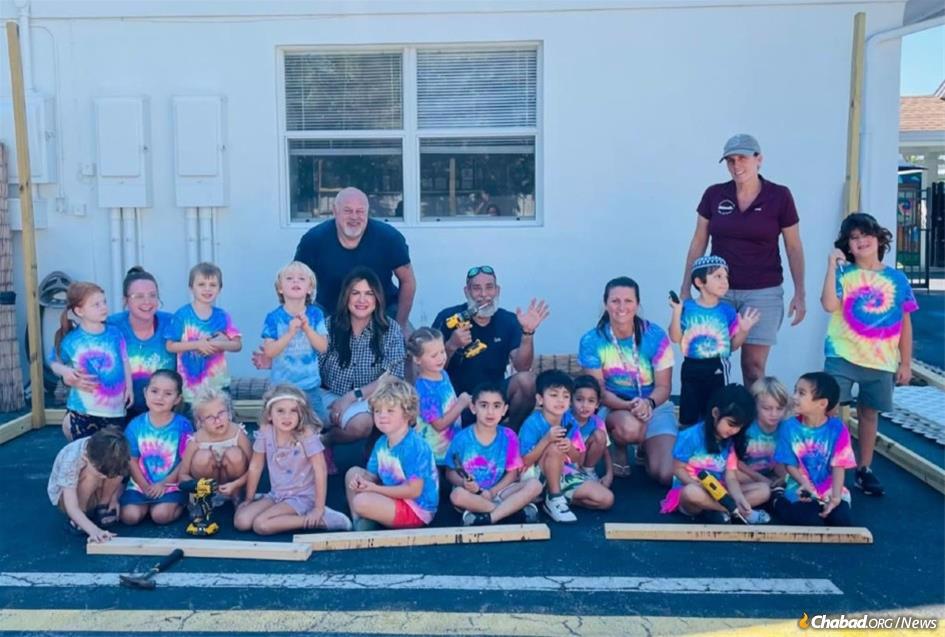 Children at the Chabad Preschool of the Arts in Naples, Fla., helped build and decorate the sukkah on their first day back to school post-hurricane. Many of the children in the preschool have been displaced or lost their homes completely.