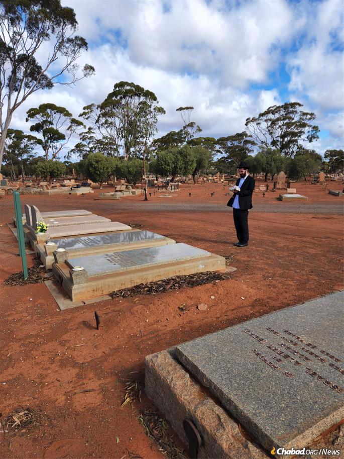 Rabbis from Chabad of RARA regularly visit the cemetery when they travel through the remote area. Last year, this youg rabbi paid his respects at the Jewish gravesites in Kalgoorlie.