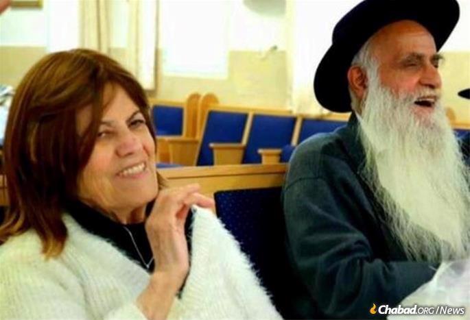 Simcha and Rabbi Yitzchak Yadgar, Chabad emissiaries to Israel since 1958, share a joyous moment.
