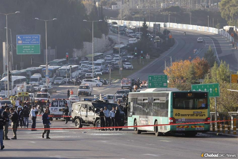 The scene of a terrorist bombing at a bus stop near the main entrance to Jerusalem. (Credit: Olivier Fitoussil/Flash90)