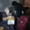 As Elderly Woman Sits in Darkness and Cold, a Chanukah Visit in Ukraine