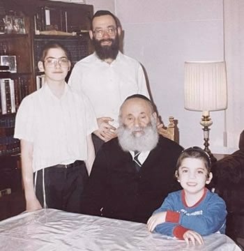 Left to right: Moshe, Yitzchok Dovid (father), Yishai (grandfather), Nachmi (brother).
