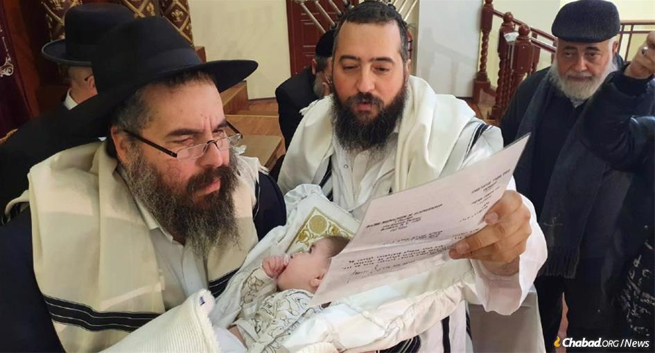 Six-month-old Menachem Mendel, who was named after the Rebbe—Rabbi Menachem Mendel Schneerson, of righteous memory—in honor of all he did to help bring Jewish life back to the city, was circumcised this week at the Chabad Choral Synagogue.