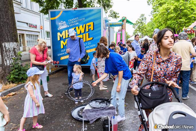 A mitzvah tank had activities for children and adults alike. - Photo courtesy Chabad of Berlin