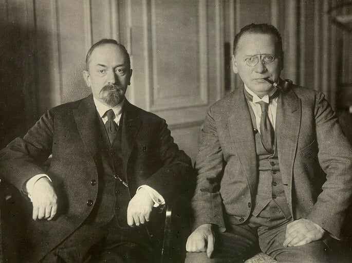 Georgy Chicherin (left) and Maxim Litvinov, then-deputy commissar of foreign affairs, both attended the Sept. 28, 1927, meeting during which it was decided to allow the Rebbe to leave the USSR with his family and library. - Credit: Wikimedia Commons.