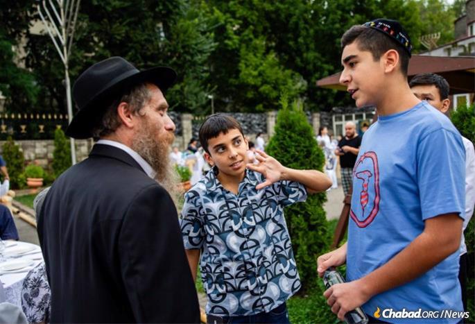Rabbi Elchan Cohen with Jewish students from Almaty, Kazakhstan. - Photo by Kotlyar