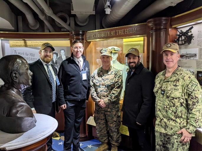 The group toured three ships docked at Norfolk Naval Base, including the aircraft carrier USS Gerald R. Ford, the amphibious assault vessel USS Bataan and the destroyer USS Cole.
