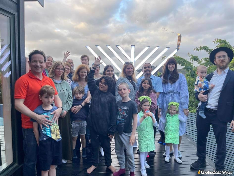 The world&#39;s first menorah-lightings of 2023 took place in New Zealand. - Photo: Chabad of New Zealand