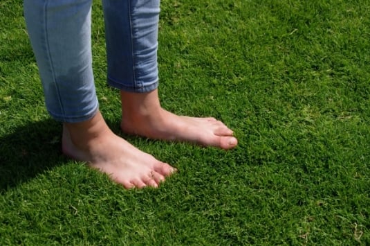 standing-barefoot-in-green-grass.jpg